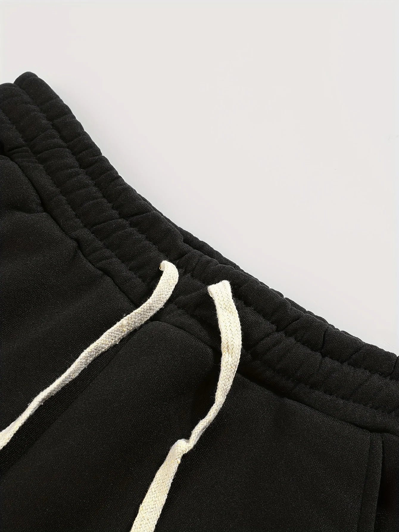 CROSS PRINT FLARED SWEATPANTS